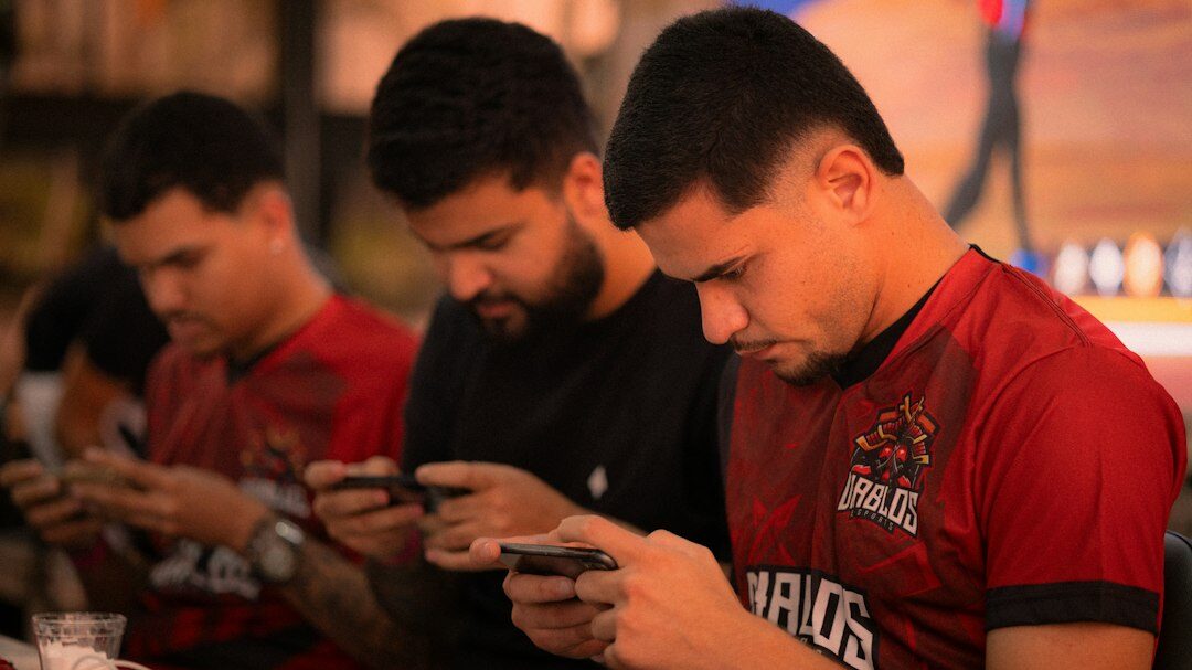 people scrolling on smartphones
